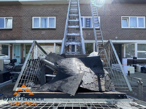 Kosten dakreparatie: dakschade aan flatgebouw in Holten